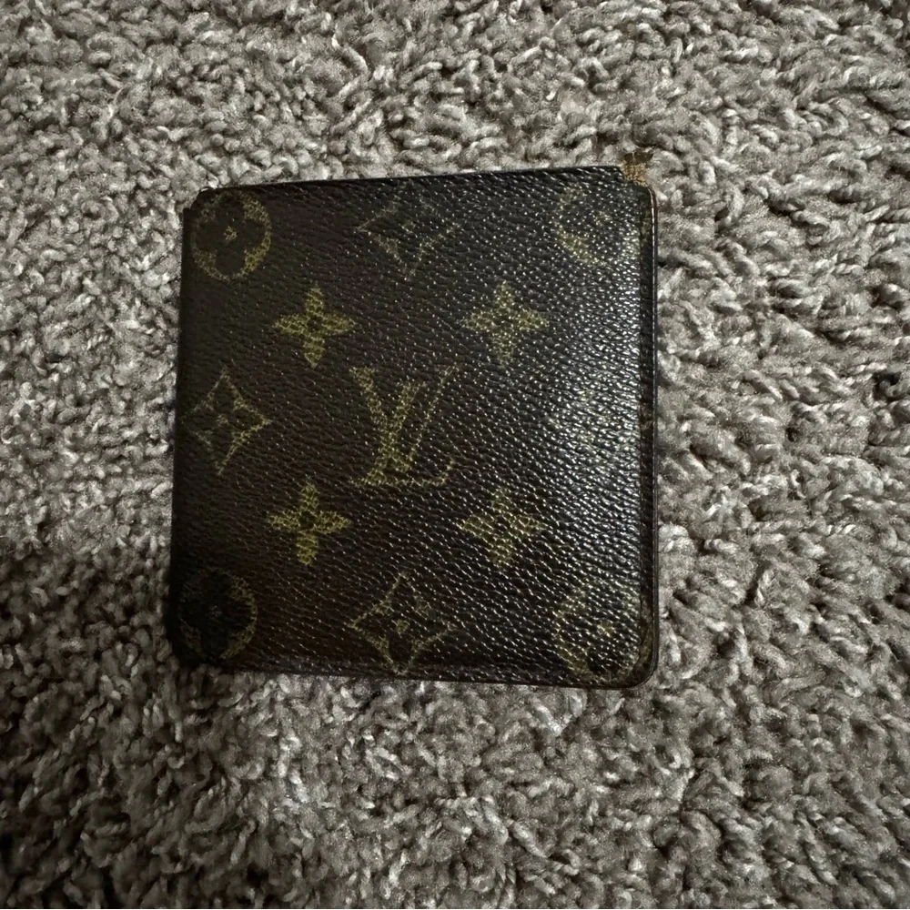 Louis Vuitton Bi fold Brown Wallet